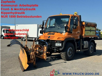 Snow removal vehicle UNIMOG U400